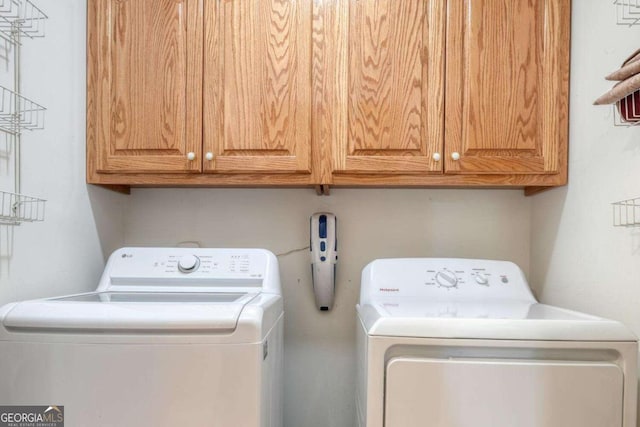 2008 Hidden Valley Rd, Hiawassee, GA 30546 - laundry room with cabinet space and separate washer and dryer