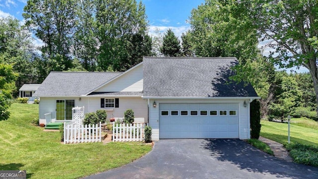 2008 Hidden Valley Rd, Hiawassee, GA 30546 - view of front of house featuring an attached garage, a shingled roof, and asphalt driveway