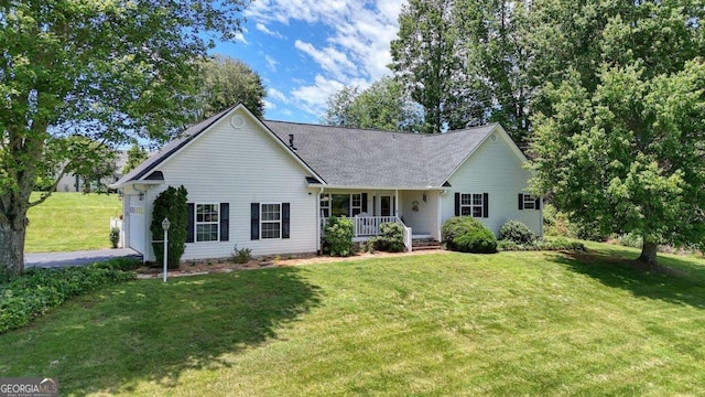 2008 Hidden Valley Rd, Hiawassee, GA 30546 - view of front facade with covered porch, a front lawn, and a shingled roof
