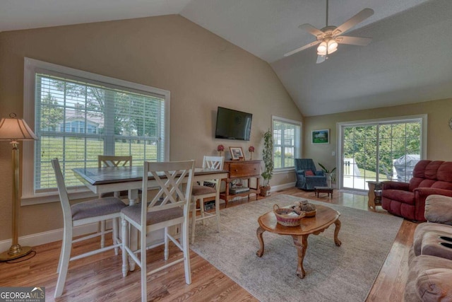 2008 Hidden Valley Rd, Hiawassee, GA 30546 - living room featuring vaulted ceiling, wood finished floors, ceiling fan, and baseboards