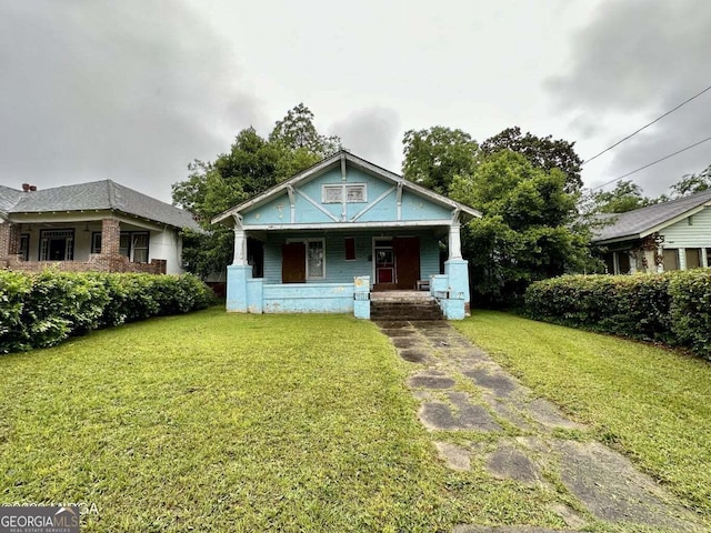 1058 Crescent Ave, Macon, GA 31204 - bungalow-style home featuring a porch and a front yard