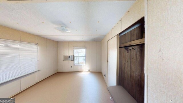 85 Lang Cir, Covington, GA 30014 - unfurnished bedroom with a wall mounted AC