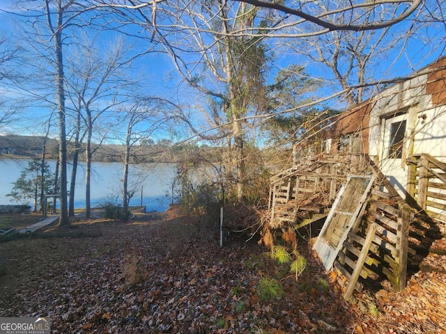 85 Lang Cir, Covington, GA 30014 - view of yard with a water view