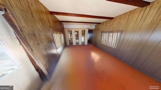 85 Lang Cir, Covington, GA 30014 - hallway with wood walls and beamed ceiling