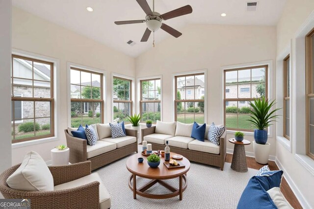 2061 Grove Field Ln, Marietta, GA 30064 - living room featuring wood finished floors, a fireplace with flush hearth, a chandelier, baseboards, and a ceiling fan
