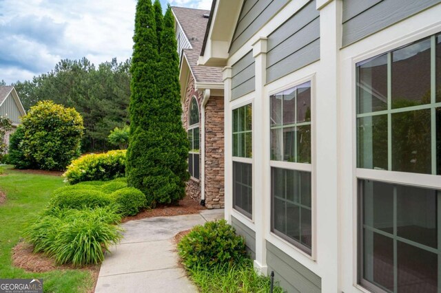 2061 Grove Field Ln, Marietta, GA 30064 - view of side of property with a yard and stone siding
