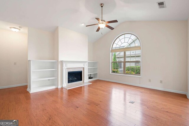 2061 Grove Field Ln, Marietta, GA 30064 - home office featuring a ceiling fan, light wood-style floors, lofted ceiling, and baseboards