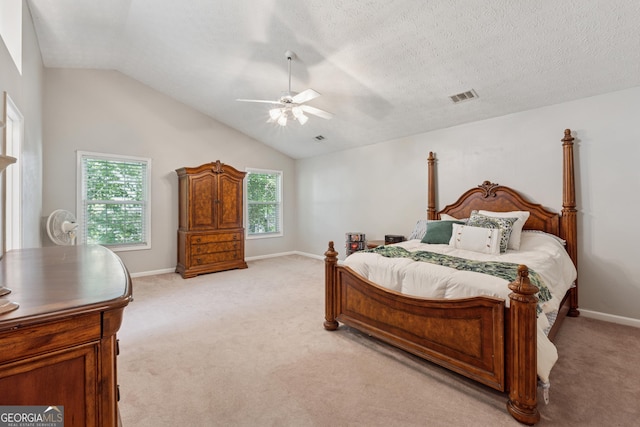 1679 Summit Place Way, Loganville, GA 30052 - bedroom featuring light carpet, vaulted ceiling, baseboards, and ceiling fan