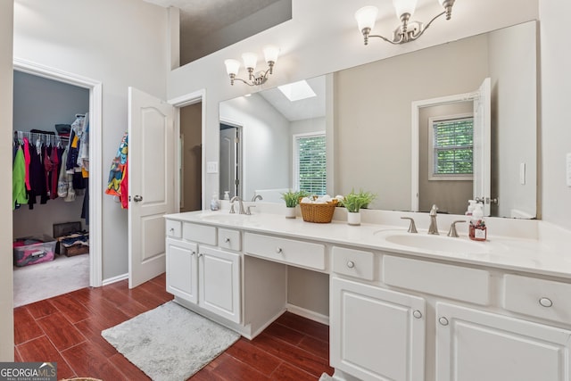 1679 Summit Place Way, Loganville, GA 30052 - full bath with double vanity, plenty of natural light, and wood finished floors