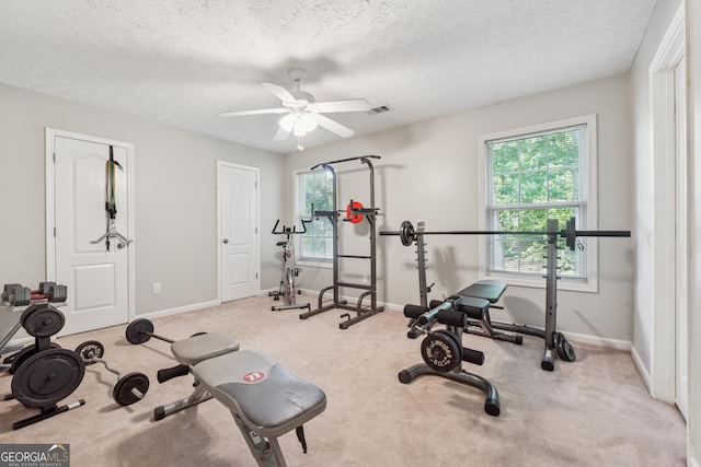 1679 Summit Place Way, Loganville, GA 30052 - exercise room featuring carpet floors, a ceiling fan, a textured ceiling, and baseboards