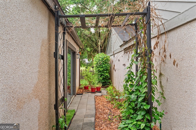 107 Linkside Dr, Saint Simons, GA 31522 - view of side of home with stucco siding