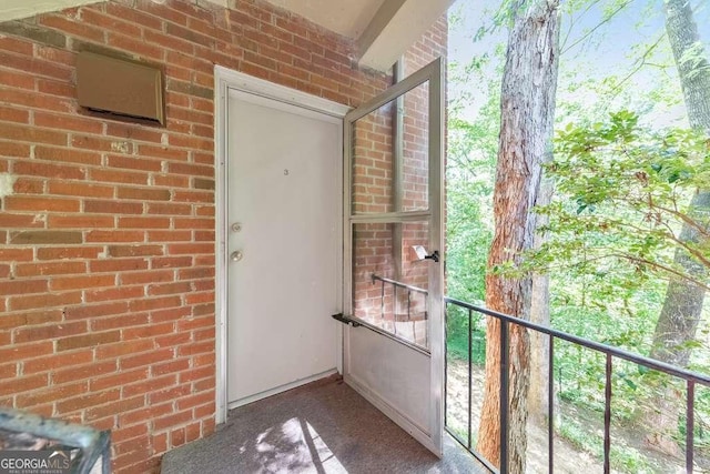 1111 Clairemont Ave Unit N3, Decatur, GA 30030 - doorway to property featuring brick siding
