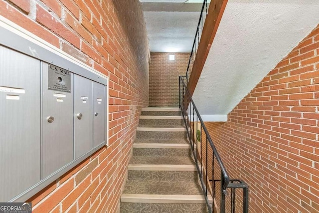 1111 Clairemont Ave Unit N3, Decatur, GA 30030 - stairs featuring brick wall
