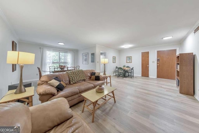 1111 Clairemont Ave Unit N3, Decatur, GA 30030 - living room featuring crown molding, light wood finished floors, and baseboards