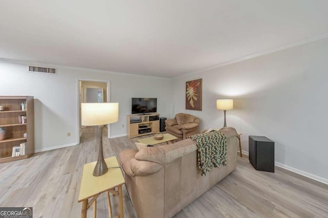 1111 Clairemont Ave Unit N3, Decatur, GA 30030 - living area featuring light wood-type flooring, ornamental molding, and baseboards