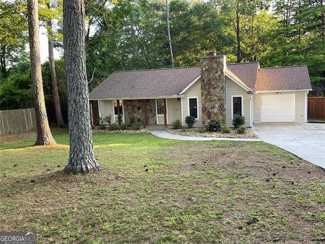 2405 Ingram Rd, Duluth, GA 30096 - view of front of property with a garage, a chimney, and concrete driveway