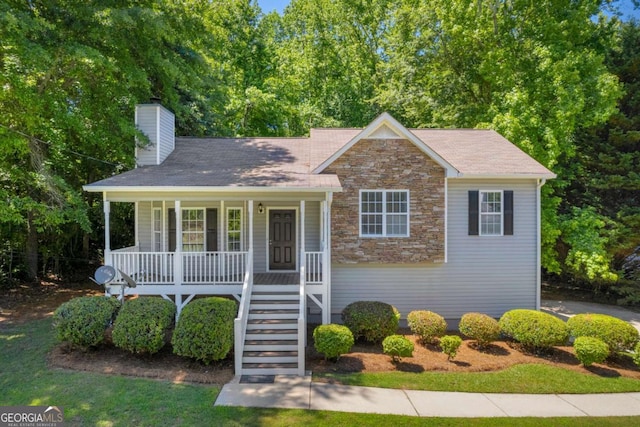 187 Gilberts Way, Temple, GA 30179 - view of front of property with a chimney, a porch, stairway, and stone siding