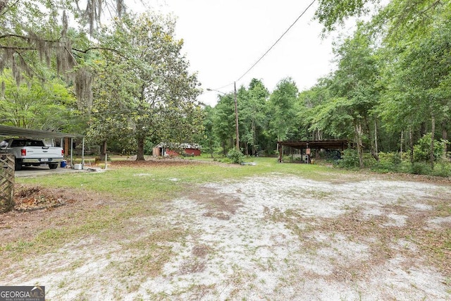 701 Log Landing Rd, Springfield, GA 31329 - view of yard featuring a carport