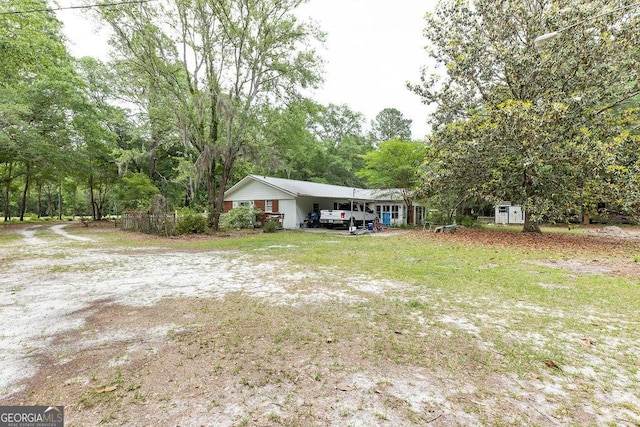 701 Log Landing Rd, Springfield, GA 31329 - view of yard featuring an attached carport