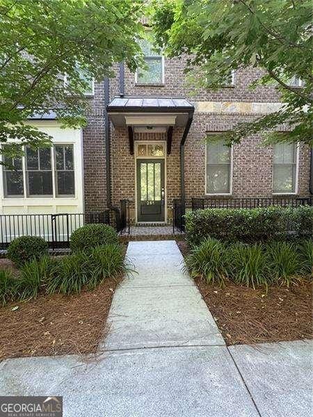 261 Cole St NE, Marietta, GA 30060 - entrance to property featuring brick siding