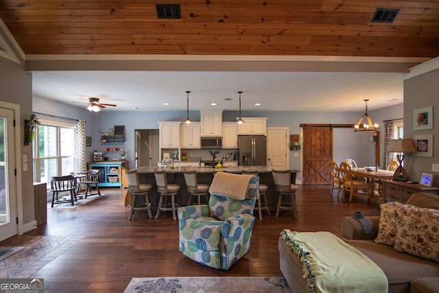 299 Savior Ln, Hamilton, GA 31811 - living area with recessed lighting, dark wood-type flooring, a chandelier, and ceiling fan