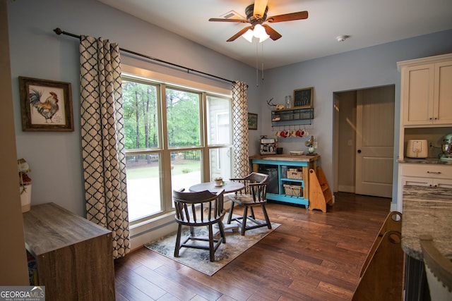 299 Savior Ln, Hamilton, GA 31811 - dining room with a ceiling fan and dark wood-style flooring