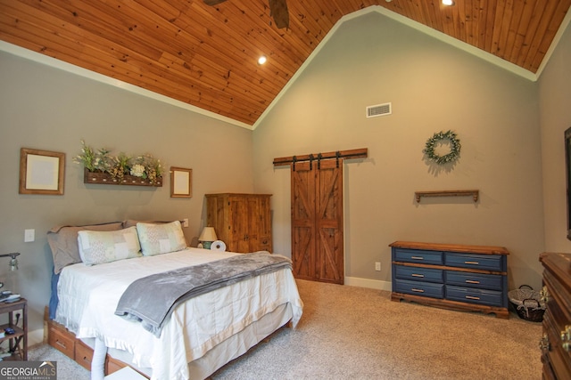 299 Savior Ln, Hamilton, GA 31811 - bedroom with wooden ceiling, carpet flooring, high vaulted ceiling, a barn door, and recessed lighting