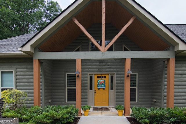 299 Savior Ln, Hamilton, GA 31811 - entrance to property with a shingled roof, log veneer siding, and covered porch