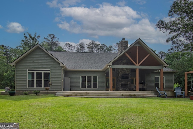 299 Savior Ln, Hamilton, GA 31811 - back of house featuring a chimney, a lawn, and a shingled roof
