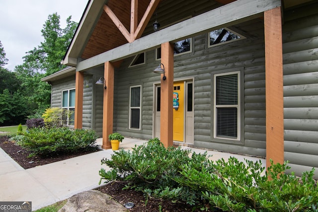 299 Savior Ln, Hamilton, GA 31811 - view of exterior entry featuring faux log siding