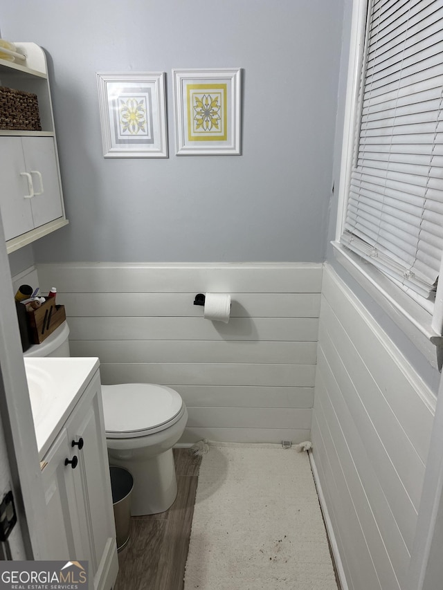 1 Trentwood Pl NW Unit A, Rome, GA 30165 - half bathroom featuring toilet, vanity, and wainscoting