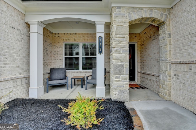 263 Blue Billed Xing, Jefferson, GA 30549 - property entrance with stone siding, brick siding, and a porch