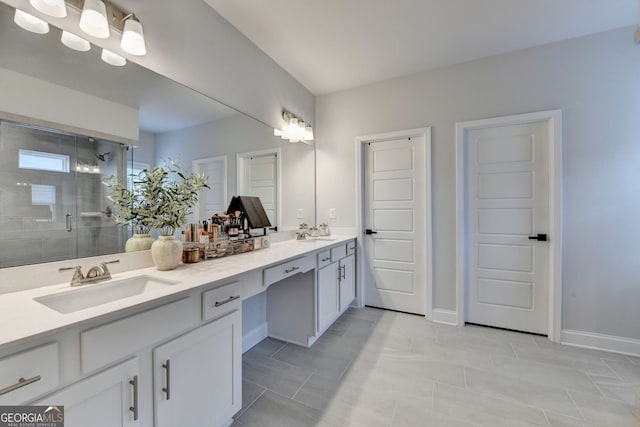263 Blue Billed Xing, Jefferson, GA 30549 - bathroom featuring double vanity, a stall shower, tile patterned floors, and baseboards
