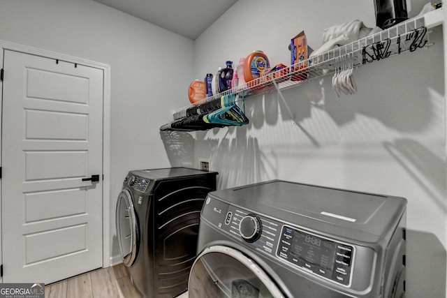 263 Blue Billed Xing, Jefferson, GA 30549 - laundry room with washing machine and dryer and light wood-style flooring