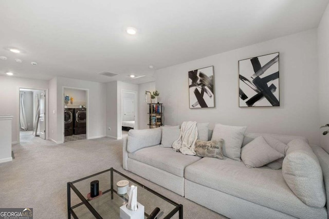 537 Garnet Dr, Acworth, GA 30101 - living area with washer and clothes dryer, light colored carpet, recessed lighting, and baseboards