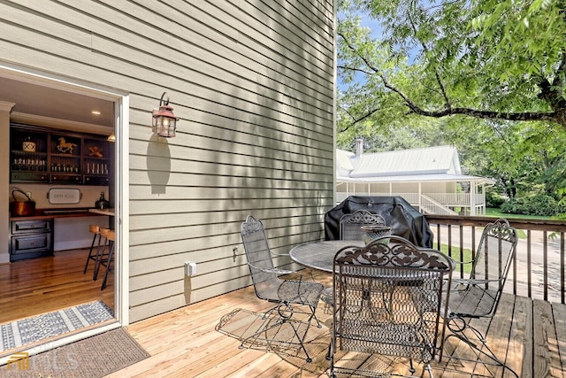643 Washington St, Clarkesville, GA 30523 - wooden deck featuring outdoor dining space and area for grilling