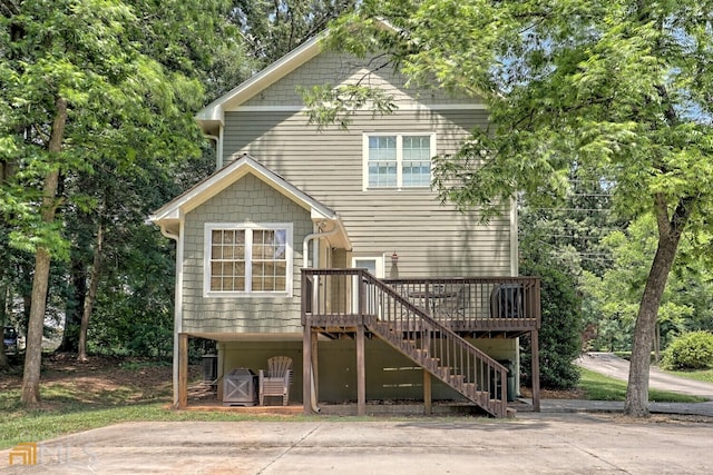 643 Washington St, Clarkesville, GA 30523 - back of house featuring stairs, a deck, and view of scattered trees