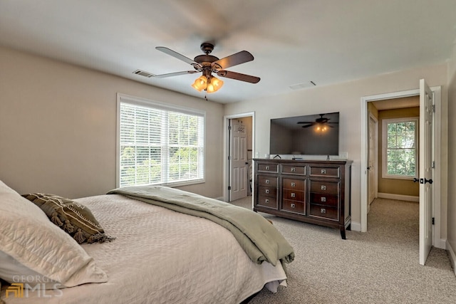 643 Washington St, Clarkesville, GA 30523 - bedroom with baseboards, light colored carpet, and ceiling fan