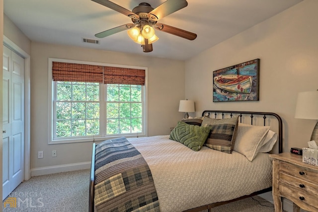 643 Washington St, Clarkesville, GA 30523 - carpeted bedroom with baseboards and ceiling fan