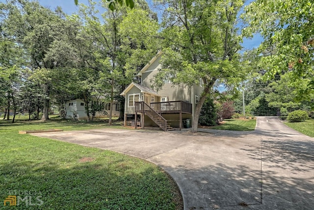 643 Washington St, Clarkesville, GA 30523 - view of property exterior featuring stairs, a lawn, and a wooden deck