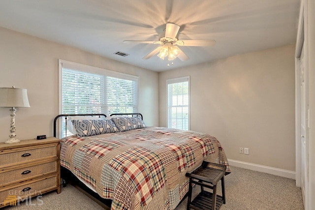 643 Washington St, Clarkesville, GA 30523 - bedroom with light colored carpet, baseboards, and ceiling fan