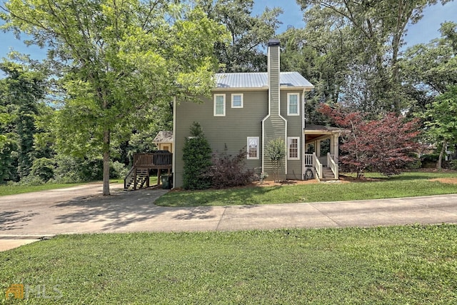 643 Washington St, Clarkesville, GA 30523 - view of front of property with stairway, a front yard, a chimney, metal roof, and a wooden deck