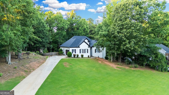 151 Dumar Ln, Hoschton, GA 30548 - view of front of home featuring driveway and a front yard