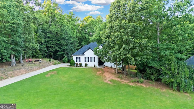 151 Dumar Ln, Hoschton, GA 30548 - view of front of property with a front lawn, concrete driveway, and roof with shingles