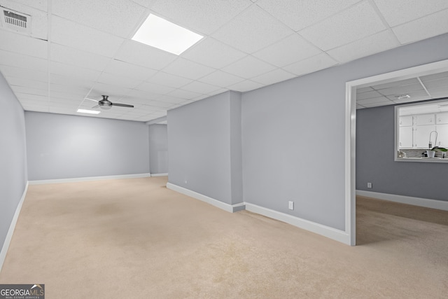 151 Dumar Ln, Hoschton, GA 30548 - finished below grade area with carpet, a drop ceiling, ceiling fan, and baseboards