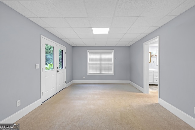 151 Dumar Ln, Hoschton, GA 30548 - spare room with a paneled ceiling, carpet, and baseboards