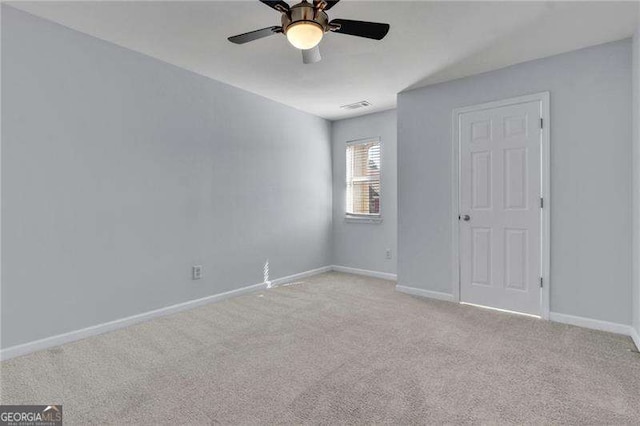 328 Oaktown Ct, Lawrenceville, GA 30044 - empty room featuring carpet floors, ceiling fan, and baseboards