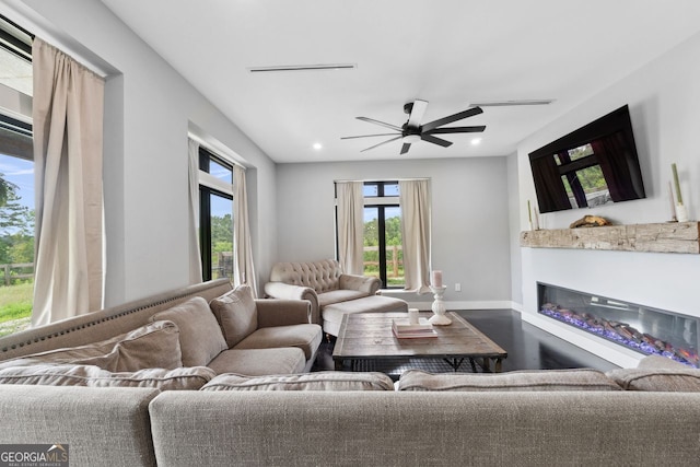 1971 Centennial Rd, Rutledge, GA 30663 - living room with ceiling fan, a glass covered fireplace, baseboards, wood finished floors, and recessed lighting