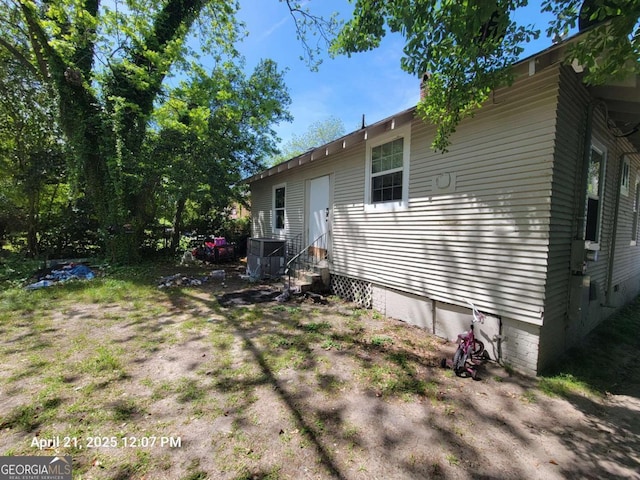 1336 Winton Ave, Macon, GA 31204 - view of property exterior with entry steps, crawl space, and cooling unit