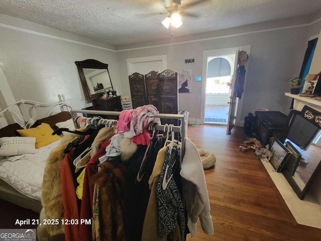 1336 Winton Ave, Macon, GA 31204 - bedroom with wood finished floors, a textured ceiling, ornamental molding, and ceiling fan